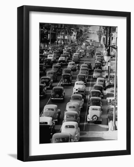 Traveling Through Rush Hour Traffic in Downtown Los Angeles-Loomis Dean-Framed Photographic Print