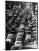 Traveling Through Rush Hour Traffic in Downtown Los Angeles-Loomis Dean-Mounted Photographic Print