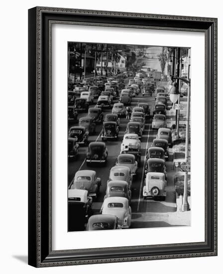 Traveling Through Rush Hour Traffic in Downtown Los Angeles-Loomis Dean-Framed Photographic Print