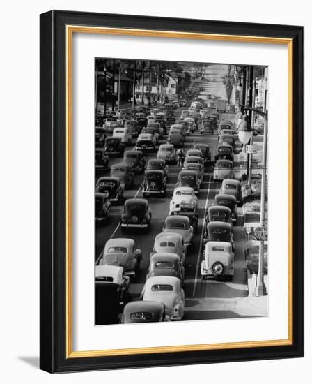 Traveling Through Rush Hour Traffic in Downtown Los Angeles-Loomis Dean-Framed Photographic Print