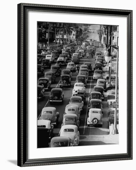 Traveling Through Rush Hour Traffic in Downtown Los Angeles-Loomis Dean-Framed Photographic Print