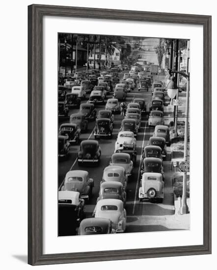 Traveling Through Rush Hour Traffic in Downtown Los Angeles-Loomis Dean-Framed Photographic Print