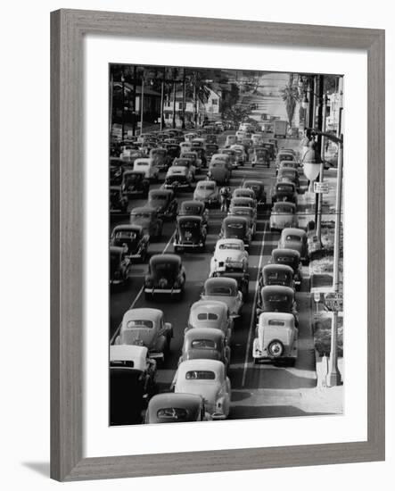 Traveling Through Rush Hour Traffic in Downtown Los Angeles-Loomis Dean-Framed Photographic Print