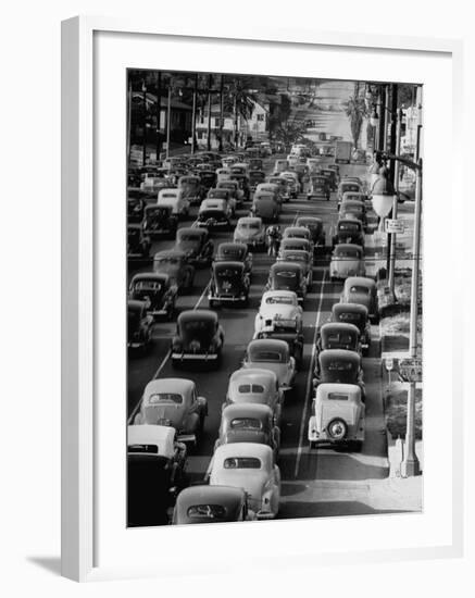 Traveling Through Rush Hour Traffic in Downtown Los Angeles-Loomis Dean-Framed Photographic Print