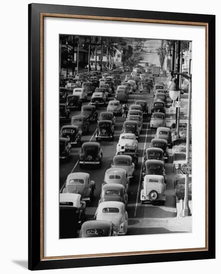 Traveling Through Rush Hour Traffic in Downtown Los Angeles-Loomis Dean-Framed Photographic Print