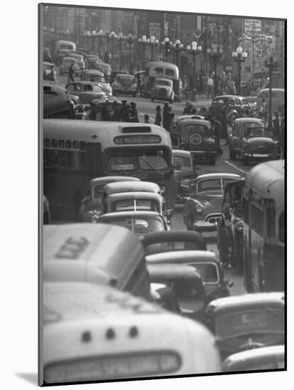 Traveling Through Rush Hour Traffic in Downtown Los Angeles-Loomis Dean-Mounted Photographic Print