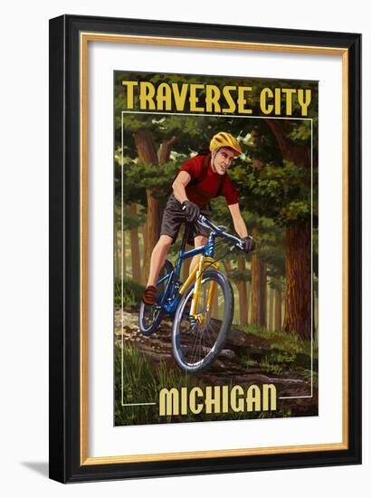 Traverse City, Michigan - Mountain Biker in Trees-Lantern Press-Framed Art Print