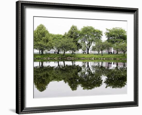 Trees are Reflected in Still Water on the Esplanade Along the Charles River in Boston-null-Framed Photographic Print