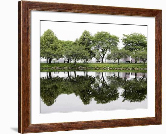 Trees are Reflected in Still Water on the Esplanade Along the Charles River in Boston-null-Framed Photographic Print