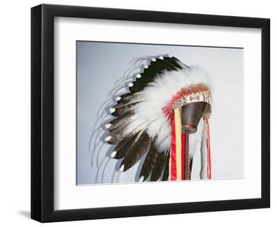 Half-length portrait of Umatilla youth in full feather headdress, beaded  buckskin shirt and shell bead necklace. Poster Print - Item #  VARBLL058747626L - Posterazzi