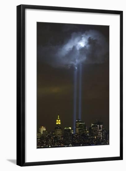 Tribute in Light Memorial Illuminates a Passing Cloud Above Lower Manhattan-null-Framed Photo