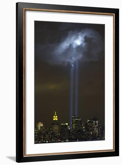 Tribute in Light Memorial Illuminates a Passing Cloud Above Lower Manhattan-null-Framed Photo