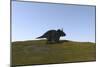 Triceratops Walking across a Grassy Field-null-Mounted Art Print