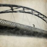 A Man Crossing a Bridge on a Raining Day-Trigger Image-Photographic Print