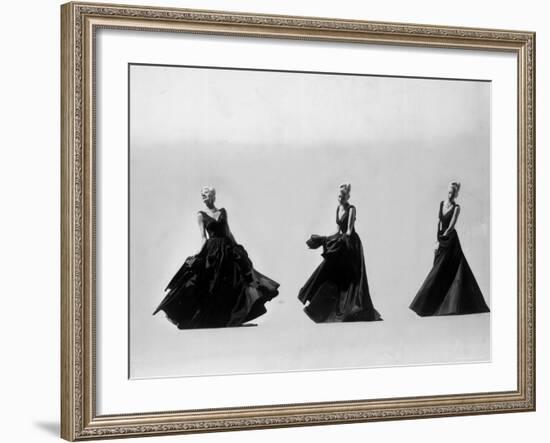 Triple Image of Model Demonstrating Swirling Motion of Black Taffeta Ball Gown Designed by Adrian-Gjon Mili-Framed Photographic Print