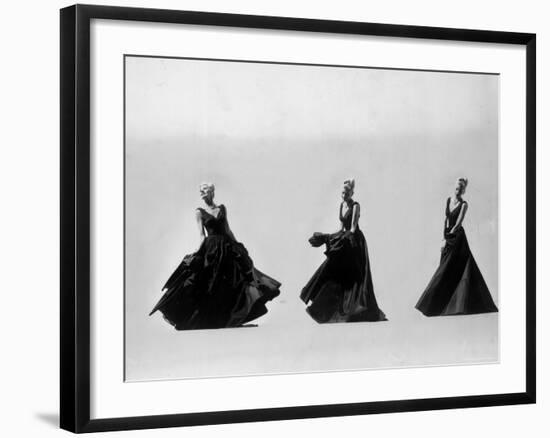 Triple Image of Model Demonstrating Swirling Motion of Black Taffeta Ball Gown Designed by Adrian-Gjon Mili-Framed Photographic Print