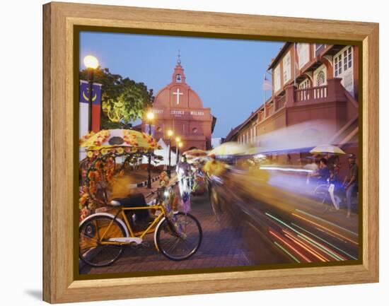 Trishaws Passing in Town Square, Melaka, Malaysia, Southeast Asia, Asia-Ian Trower-Framed Premier Image Canvas