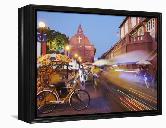 Trishaws Passing in Town Square, Melaka, Malaysia, Southeast Asia, Asia-Ian Trower-Framed Premier Image Canvas