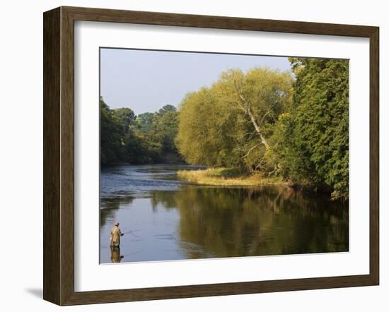 Trout Fisherman Casting to a Fish on the River Dee, Wrexham, Wales-John Warburton-lee-Framed Photographic Print