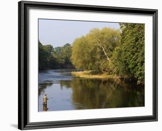 Trout Fisherman Casting to a Fish on the River Dee, Wrexham, Wales-John Warburton-lee-Framed Photographic Print