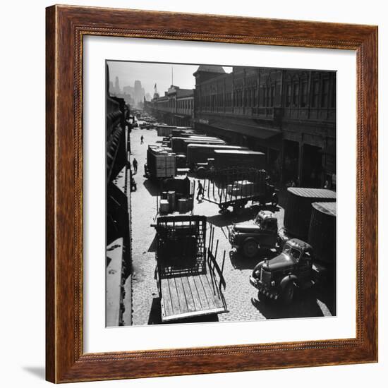 Trucks Clog Roadway in Front of Street-Level Entrances to Long Row of Hudson River Piers on West St-Andreas Feininger-Framed Photographic Print