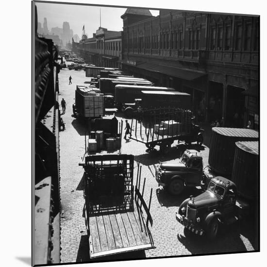 Trucks Clog Roadway in Front of Street-Level Entrances to Long Row of Hudson River Piers on West St-Andreas Feininger-Mounted Photographic Print