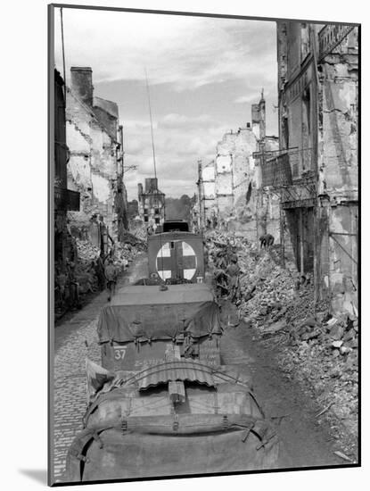 Trucks Driving Through the Ruined Town of Falaise-null-Mounted Photographic Print