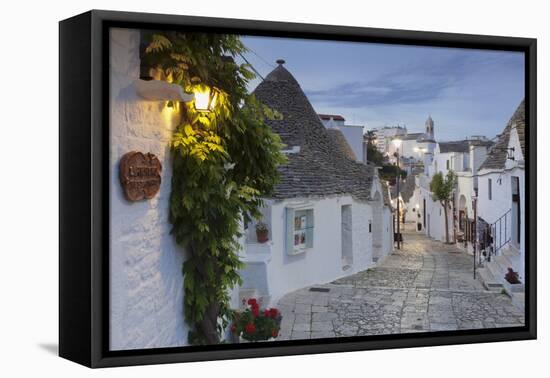 Trulli, traditional houses, Rione Monti area, Alberobello, UNESCO World Heritage Site, Valle d'Itri-Markus Lange-Framed Premier Image Canvas