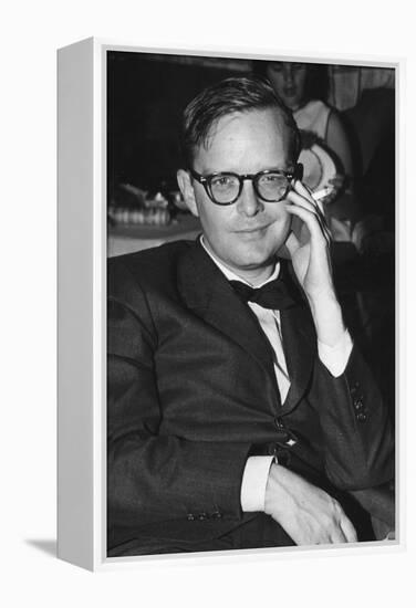 Truman Capote Sitting in the Restaurant of the M-S Vulcania-null-Framed Premier Image Canvas