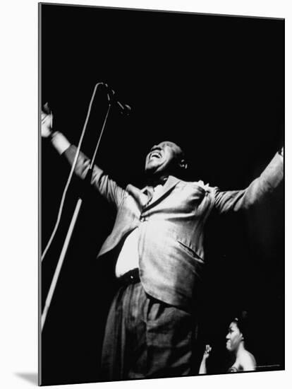 Trumpeter Louis Armstrong Belting Out His Famous Rendition of the Song "Hello Dolly" in a Nightclub-John Loengard-Mounted Premium Photographic Print