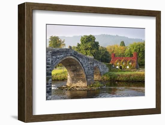 Tu Hwnt I'R Bont Tearoom and Pont Fawr (Big Bridge) in Autumn, Llanrwst, Snowdonia, Conwy, Wales-Stuart Black-Framed Photographic Print