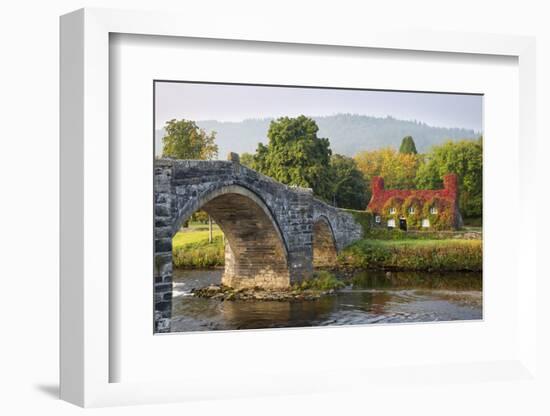 Tu Hwnt I'R Bont Tearoom and Pont Fawr (Big Bridge) in Autumn, Llanrwst, Snowdonia, Conwy, Wales-Stuart Black-Framed Photographic Print