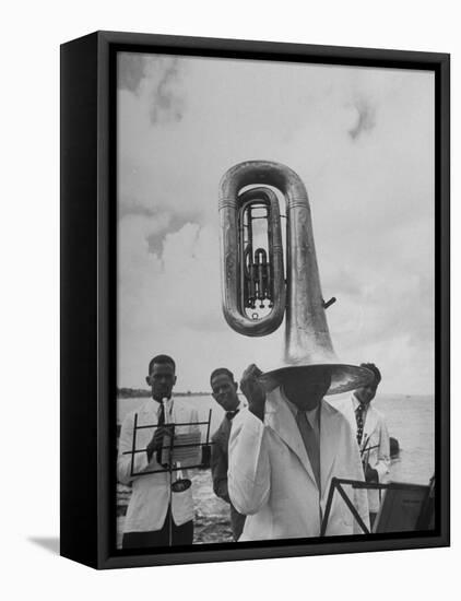 Tuba Player Keeping His Head Dry in a Rainstorm During Visit to St. Croix by Pres. Harry S. Truman-Thomas D^ Mcavoy-Framed Premier Image Canvas