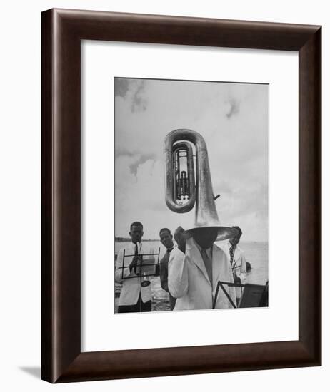 Tuba Player Keeping His Head Dry in a Rainstorm During Visit to St. Croix by Pres. Harry S. Truman-Thomas D^ Mcavoy-Framed Photographic Print