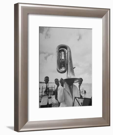 Tuba Player Keeping His Head Dry in a Rainstorm During Visit to St. Croix by Pres. Harry S. Truman-Thomas D^ Mcavoy-Framed Photographic Print