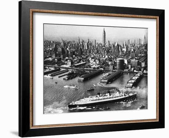 Tugboats Aid Ocean SS Queen Mary While Docking at 51st Street Pier with NYC Skyline in Background-null-Framed Photographic Print