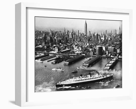 Tugboats Aid Ocean SS Queen Mary While Docking at 51st Street Pier with NYC Skyline in Background-null-Framed Photographic Print
