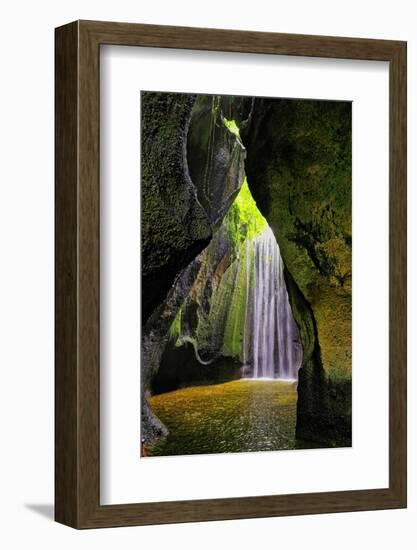 Tukad Cepung Waterfall in the central mountains of Bali, Indonesia.-Greg Johnston-Framed Photographic Print