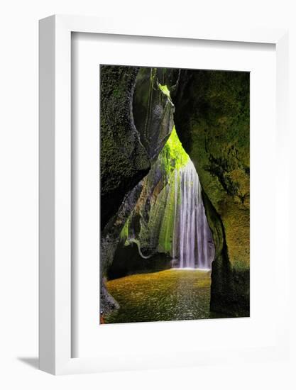 Tukad Cepung Waterfall in the central mountains of Bali, Indonesia.-Greg Johnston-Framed Photographic Print