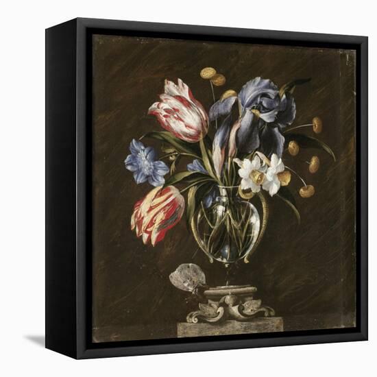 Tulips, Daffodils, Irises and Other Flowers in a Glass Vase on a Sculpted Stand, with a Butterfly-Juan de Arellano-Framed Premier Image Canvas