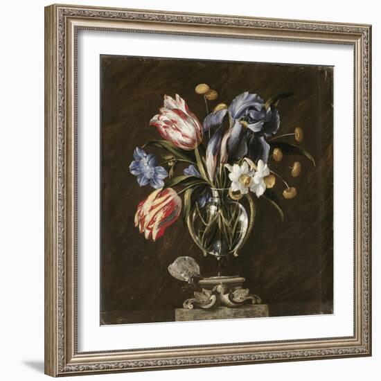Tulips, Daffodils, Irises and Other Flowers in a Glass Vase on a Sculpted Stand, with a Butterfly-Juan de Arellano-Framed Giclee Print