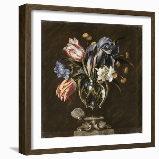 Tulips, Daffodils, Irises and Other Flowers in a Glass Vase on a Sculpted Stand, with a Butterfly-Juan de Arellano-Framed Giclee Print