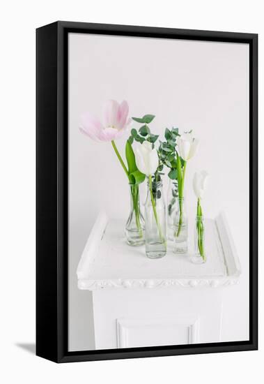 Tulips in Bottles on White Background Studio-Ihor Kopakov-Framed Premier Image Canvas