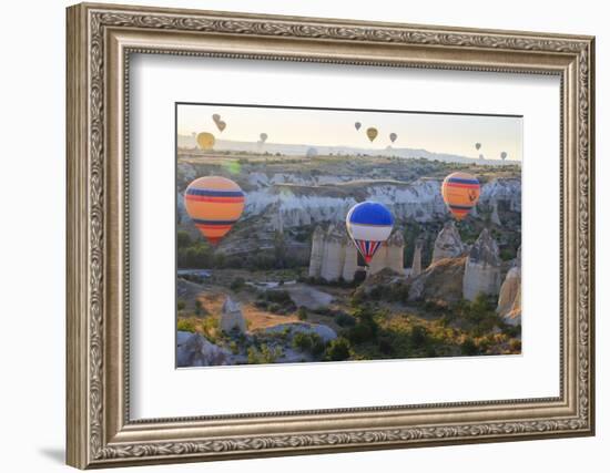 Turkey, Anatolia, Cappadocia, Goreme. Hot air balloons above Red Valley.-Emily Wilson-Framed Photographic Print