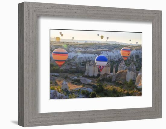 Turkey, Anatolia, Cappadocia, Goreme. Hot air balloons above Red Valley.-Emily Wilson-Framed Photographic Print