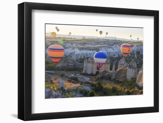 Turkey, Anatolia, Cappadocia, Goreme. Hot air balloons above Red Valley.-Emily Wilson-Framed Photographic Print