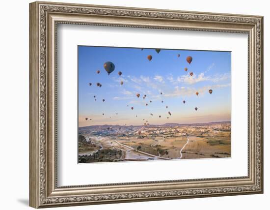 Turkey, Anatolia, Cappadocia, Goreme. Hot air balloons above Red Valley.-Emily Wilson-Framed Photographic Print