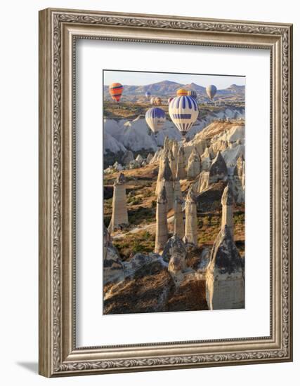 Turkey, Anatolia, Cappadocia, Goreme. Hot air balloons above Red Valley.-Emily Wilson-Framed Photographic Print