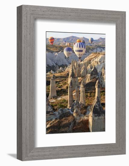 Turkey, Anatolia, Cappadocia, Goreme. Hot air balloons above Red Valley.-Emily Wilson-Framed Photographic Print