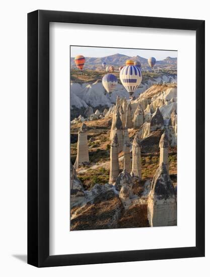 Turkey, Anatolia, Cappadocia, Goreme. Hot air balloons above Red Valley.-Emily Wilson-Framed Photographic Print